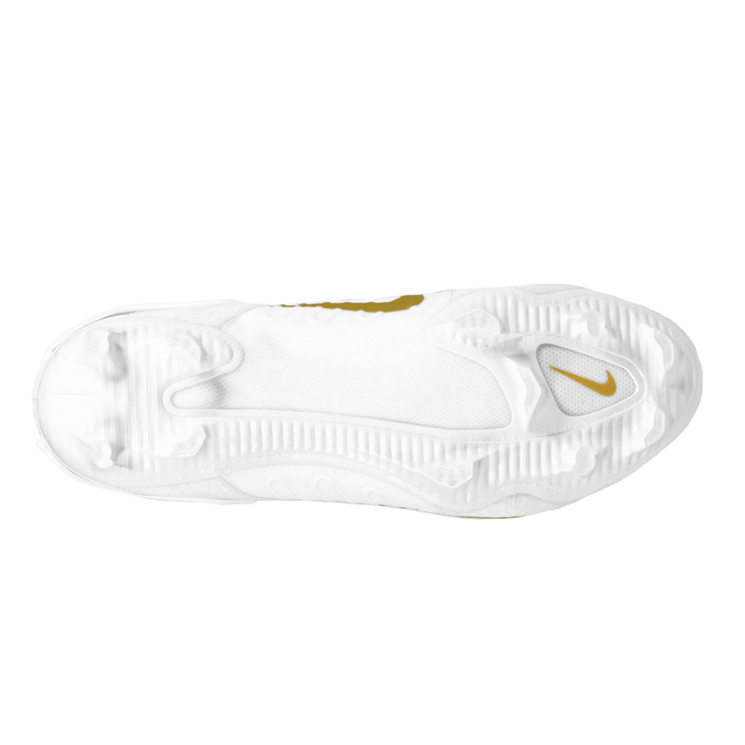 The bottom view of a white Nike Alpha Huarache 9 Elite Mid Cleat is shown, showcasing the sole's complex tread patterns for multidirectional traction. A small yellow-orange swoosh logo is prominently featured in the design.